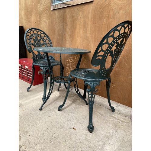 1281 - A CAST ALLOY BISTRO SET COMPRISING OF A ROUND TABLE AND TWO CHAIRS