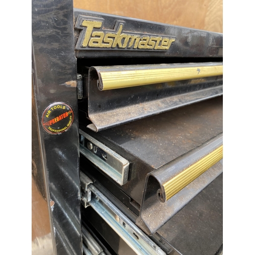 1284 - A FOUR WHEELED TASKMASTER TOOL BOX