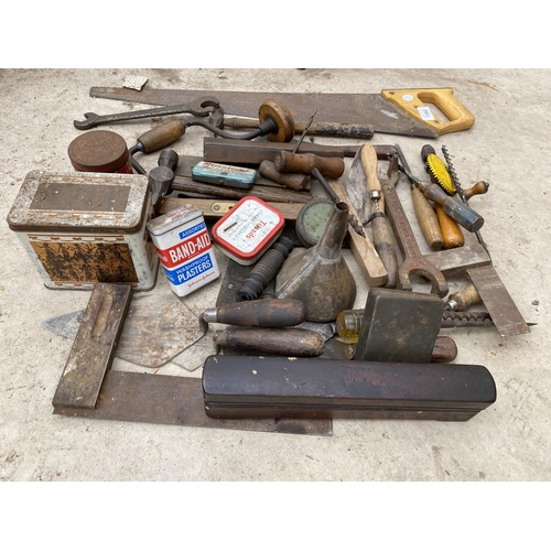 1302 - AN ASSORTMENT OF TOOLS TO INCLUDE HAMMERS, SPANNERS AND SHARPENING STONES ETC