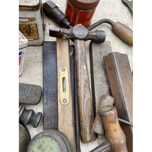 1302 - AN ASSORTMENT OF TOOLS TO INCLUDE HAMMERS, SPANNERS AND SHARPENING STONES ETC