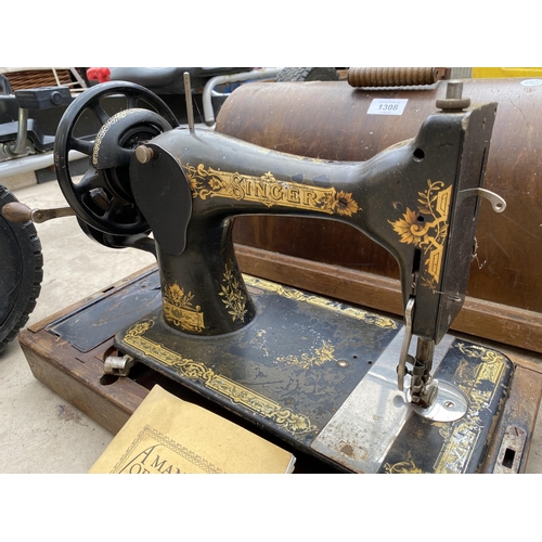 1308 - A VINTAGE SINGER SEWING MACHINE WITH WOODEN CARRY CASE