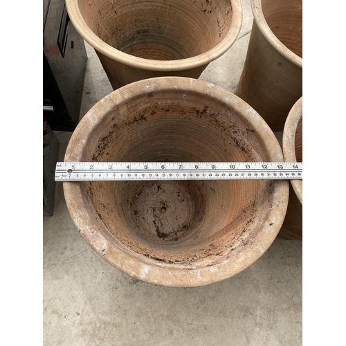 1318 - A COLLECTION OF EIGHT LARGE TERRACOTTA GARDEN POTS