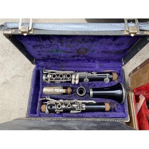 1320 - A COLLECTION OF TEN VINTAGE CASED CLARINETS