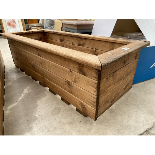 1338 - A LARGE AS NEW CHARLES TAYLOR STYLE WOODEN PLANTER TROUGH