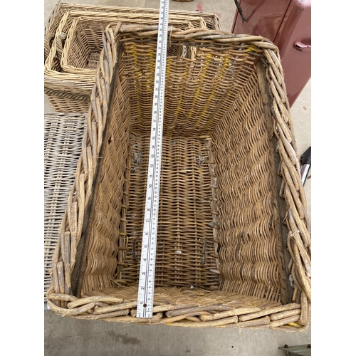 1343 - AN ASSORTMENT OF LARGE WICKER BASKETS TO INCLUDE A LARGE LOG BASKET ETC