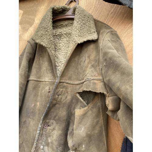 1252 - A RARE COLLECTION OF FRED DIBNAH MBE CLOTHING TO INCLUDE BIB AND BRACES, JACKETS AND FURTHER WORK CL... 