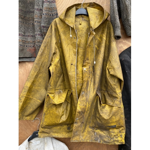 1252 - A RARE COLLECTION OF FRED DIBNAH MBE CLOTHING TO INCLUDE BIB AND BRACES, JACKETS AND FURTHER WORK CL... 