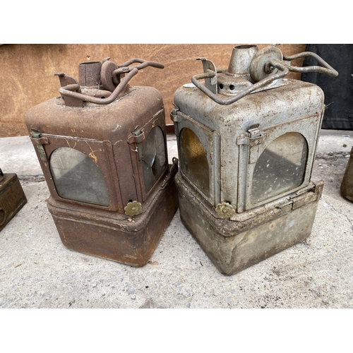 1253 - A PAIR OF VINTAGE GALVANISED PARAFIN LAMPS