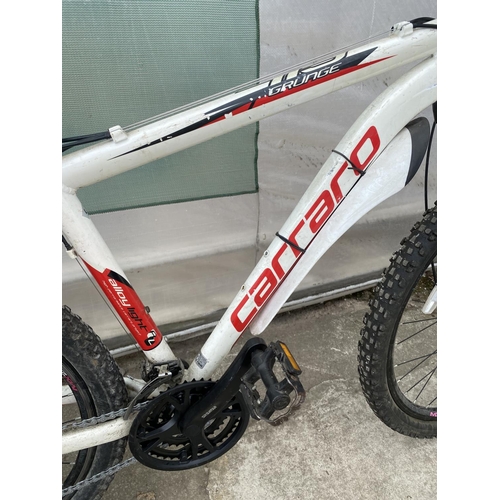 1350 - A CARRARO GRUNGE MOUNTAIN BIKE WITH FRONT SUSPENSION AND 21 SPEED SHIMANO GEAR SYSTEM