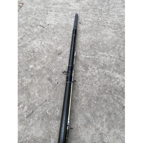 1365 - A TWO SECTION CARBON FISHING ROD WITH QUIVER TIP