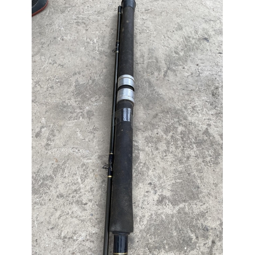 1365 - A TWO SECTION CARBON FISHING ROD WITH QUIVER TIP