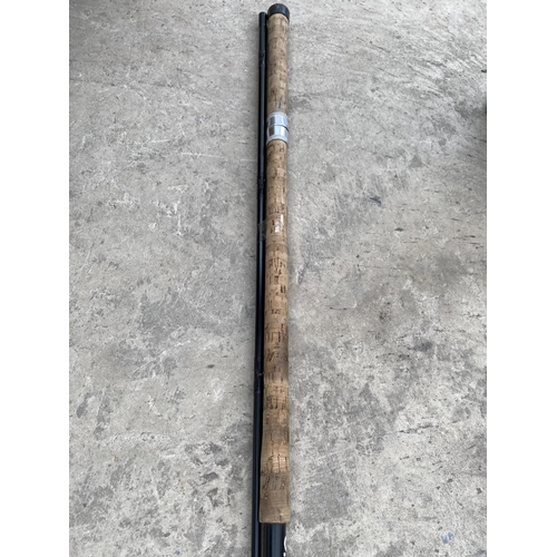 1370 - A TWO SECTION CARBON FISHING ROD