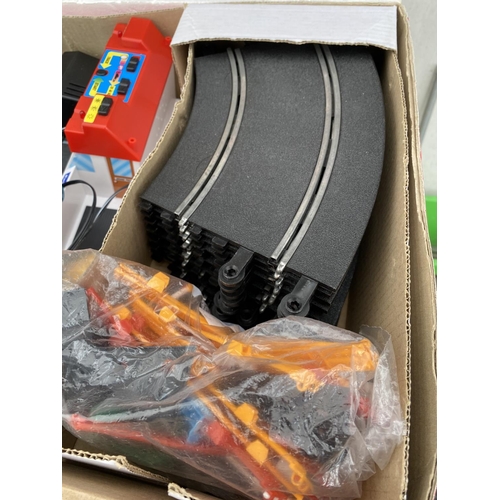 1378 - TWO BOXES OF FORMULA ONE SCALEXTRIC