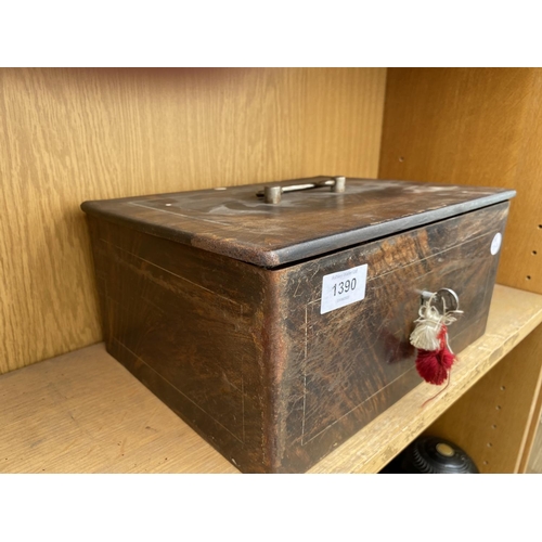 1390 - A VINTAGE METAL CASH TIN WITH DOUBLE LOCKING MECHANISM