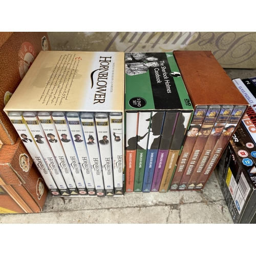 1413 - AN ASSORTMENT OF DVDS TO INCLUDE CARRY ON BOX SETS