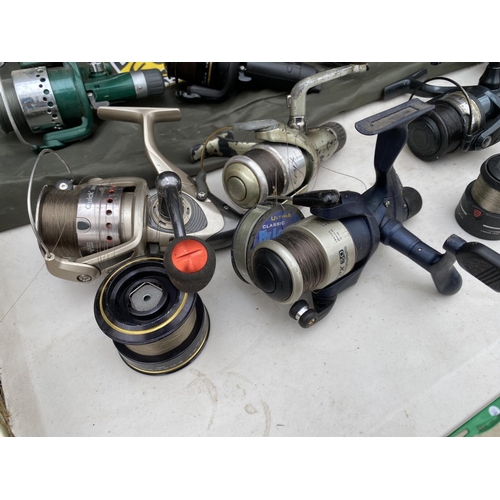 1419 - A LARGE ASSORTMENT OF FISHING REELS TO INCLUDE A EURORUNNER 500, A WYCHWOOD SOLACE10 AND A VRX ETC