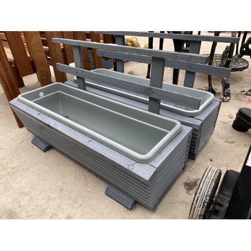 1436 - A PAIR OF WOODEN TROUGH PLANTERS WITH PLASTIC INSERTS