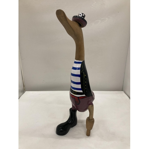 252 - A WOODEN 'PIRATE' DUCK WITH A PEG LEG HEIGHT 39.5CM