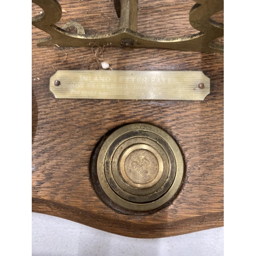 281 - TWO SETS OF WOOD AND BRASS POSTAL SCALES WITH WEIGHTS