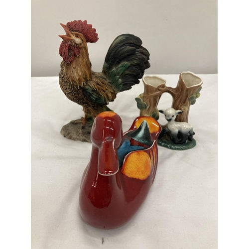 291 - A POOLE POTTERY DUCK IN RED AND ORANGE, HORNSEA POTTERY VASE WITH LAMB AND A RESIN COCKEREL