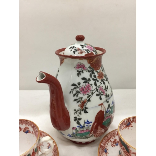 144 - A SIGNED ORIENTAL TEA SET COMPRISING OF A TEAPOT AND THREE CUPS AND SAUCERS