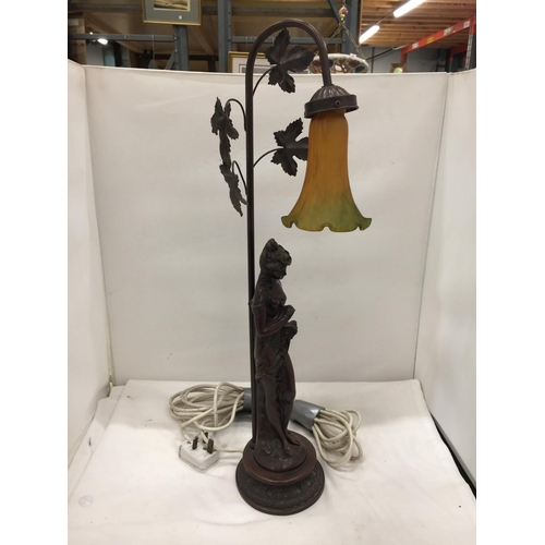 152 - A TABLE LAMP WITH A RESIN LADY BASE AND A FLORAL SHADE HEIGHT 64CM