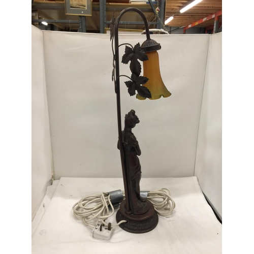 152 - A TABLE LAMP WITH A RESIN LADY BASE AND A FLORAL SHADE HEIGHT 64CM