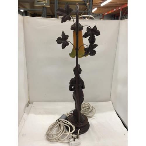 152 - A TABLE LAMP WITH A RESIN LADY BASE AND A FLORAL SHADE HEIGHT 64CM