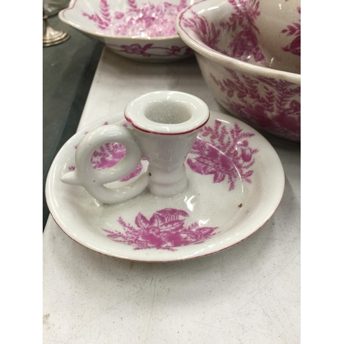 155 - A PINK AND WHITE FLORAL PATTERN BATHROOM SET TO INCLUDE JUG AND BOWL, CANDLESTICK, LARGE BOWL, LARGE... 