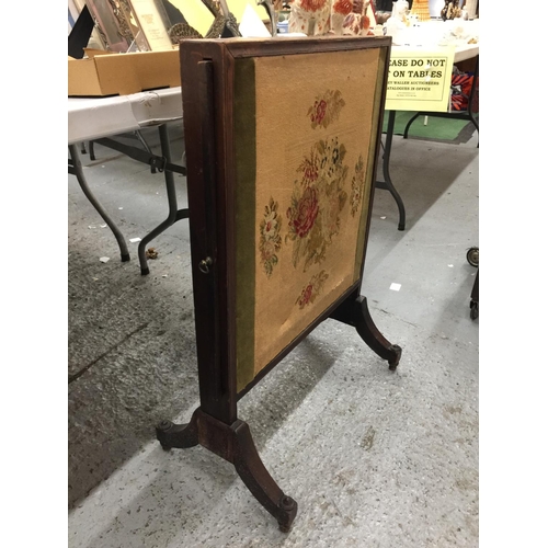 162 - A TAPESTRY FIRESCREEN WITH SLIDE OUT PANELS AND AN OAK SURROUND