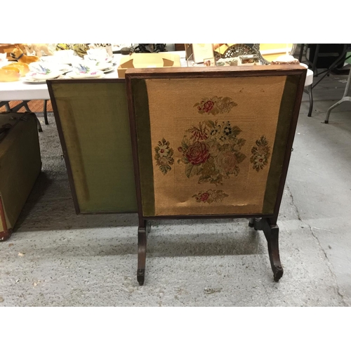 162 - A TAPESTRY FIRESCREEN WITH SLIDE OUT PANELS AND AN OAK SURROUND