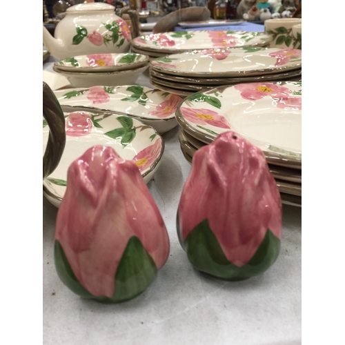 183 - A QUANTITY OF JOHNSONS BROS DESERT ROSE CERAMIC DINNERWARE TO INCLUDE PLATES, CUPS, SAUCERS, TEAPOT,... 