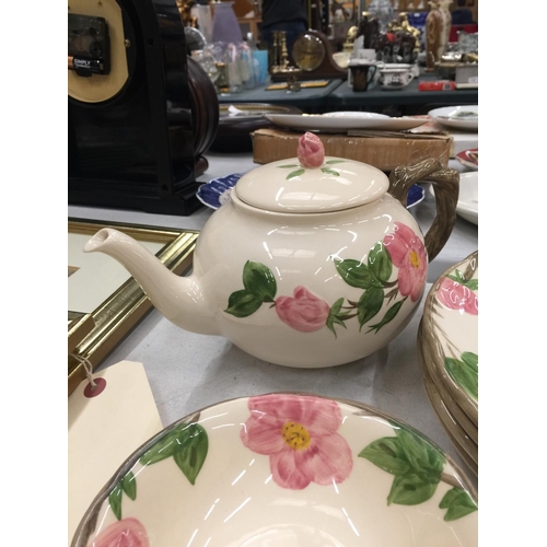 183 - A QUANTITY OF JOHNSONS BROS DESERT ROSE CERAMIC DINNERWARE TO INCLUDE PLATES, CUPS, SAUCERS, TEAPOT,... 