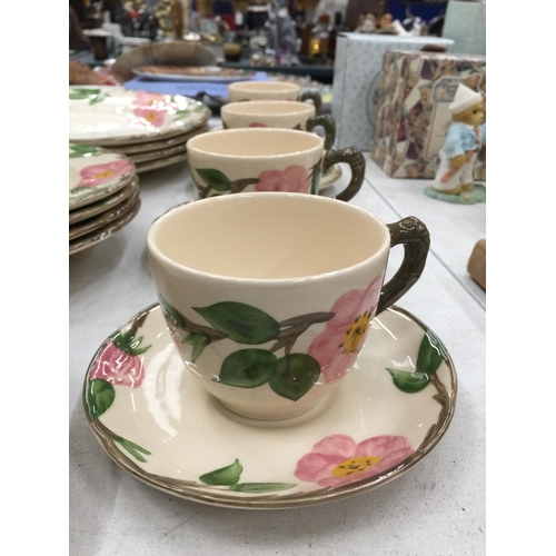 183 - A QUANTITY OF JOHNSONS BROS DESERT ROSE CERAMIC DINNERWARE TO INCLUDE PLATES, CUPS, SAUCERS, TEAPOT,... 