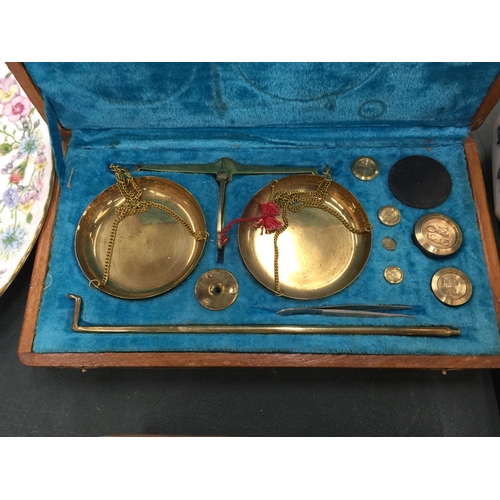 206 - A SET OF BRASS TRAVELLING SCALES AND TWO SETS OF BRASS WEIGHTS ALL IN WOODEN BOXES