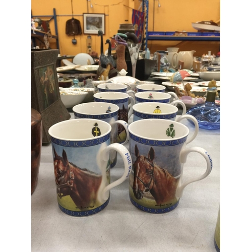 212 - A COLLECTION OF TEWLVE 'RACING LEGENDS' BONE CHINA CUPS BY GRAHAM ISOM, DANBURY MINT