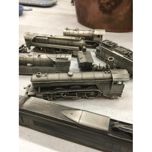 213 - THIRTEEN PEWTER MINIATURE COLLECTABLE TRAINS