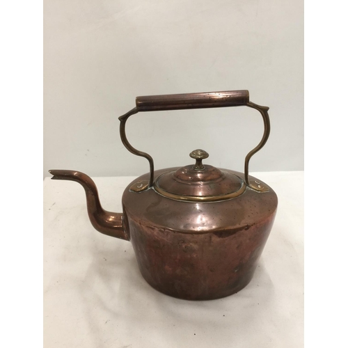 214 - A VINTAGE COPPER KETTLE PLUS A BRASS PLANTER WITH PICTURE PANELS