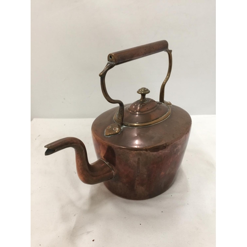 214 - A VINTAGE COPPER KETTLE PLUS A BRASS PLANTER WITH PICTURE PANELS