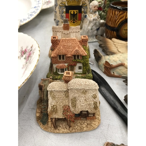 224 - A QUANTITY OF COLLECTABLE ITEMS TO INCLUDE LILLIPUT LANE COTTAGES, WADE ITEMS, GOEBEL FIGURE, DOGS, ... 