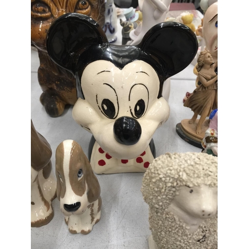 228 - A QUANTITY OF CERAMIC ITEMS TO INCLUDE PIGS, MICKEY MOUSE, DOGS, MONEY BOXES, ETC