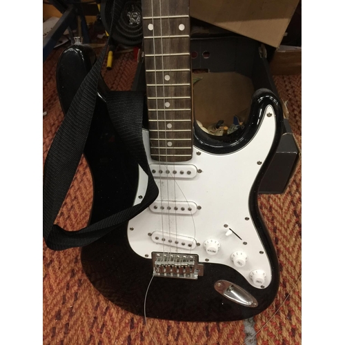 233 - A BURSWOOD BLACK AND WHITE ELECTRIC GUITAR