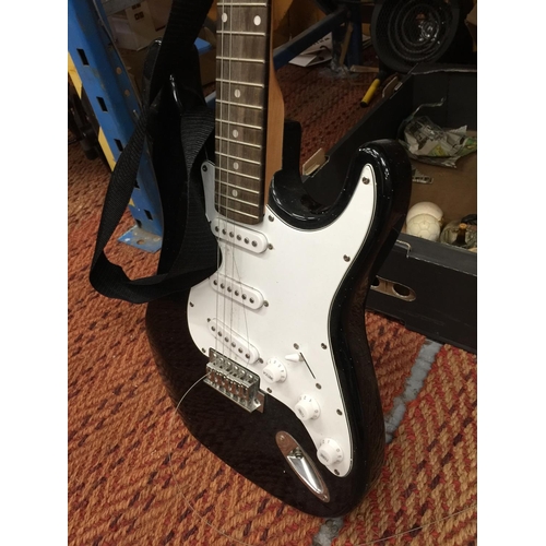 233 - A BURSWOOD BLACK AND WHITE ELECTRIC GUITAR