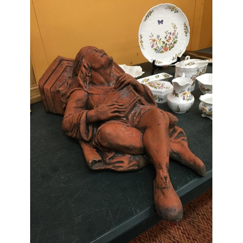 240 - A TERRACOTTA WALL HANGING MINSTREL HEIGHT 56CM