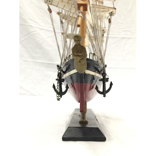 321 - A HAND PAINTED MODEL OF A THE CUTTY SARK L: 47CM