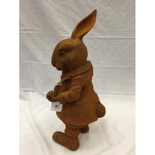 45 - A CAST IRON MR RABBIT FIGURE WITH RUSTIC FINISH H: 43CM