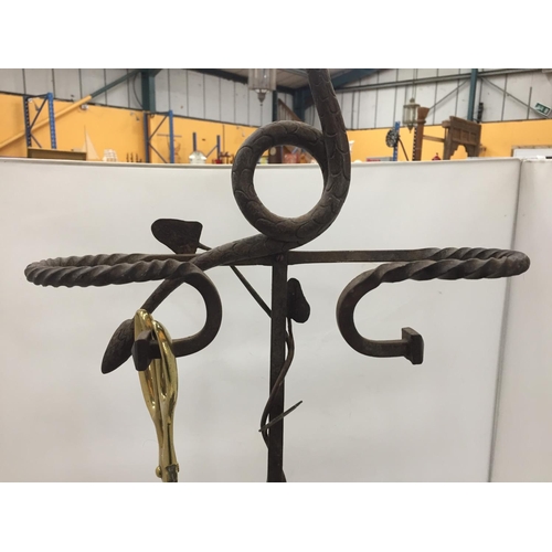 476 - A VICTORIAN WROUGHT IRON UMBRELLA STAND WITH SERPENTINE TOP AND BARLEY TWIST ARMS HEIGHT 73CM