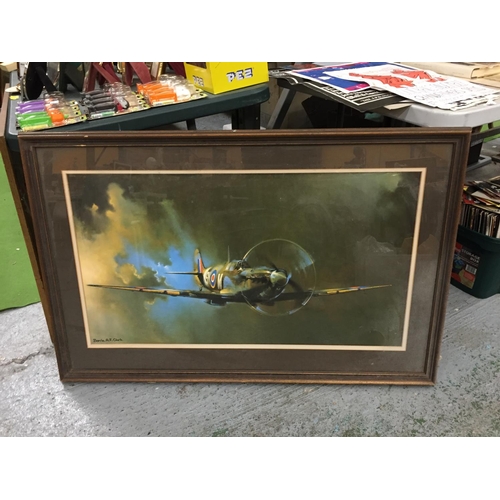 491 - A LARGE FRAMED PRINT OF A SPITFIRE 110CM X 71CM