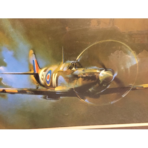 491 - A LARGE FRAMED PRINT OF A SPITFIRE 110CM X 71CM