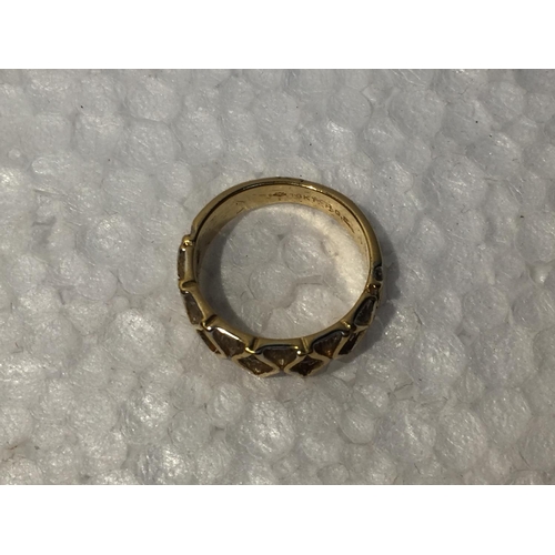 648 - A YELLOW METAL RING MARKED 18KT SIZE L IN A PRESENTATION BOX